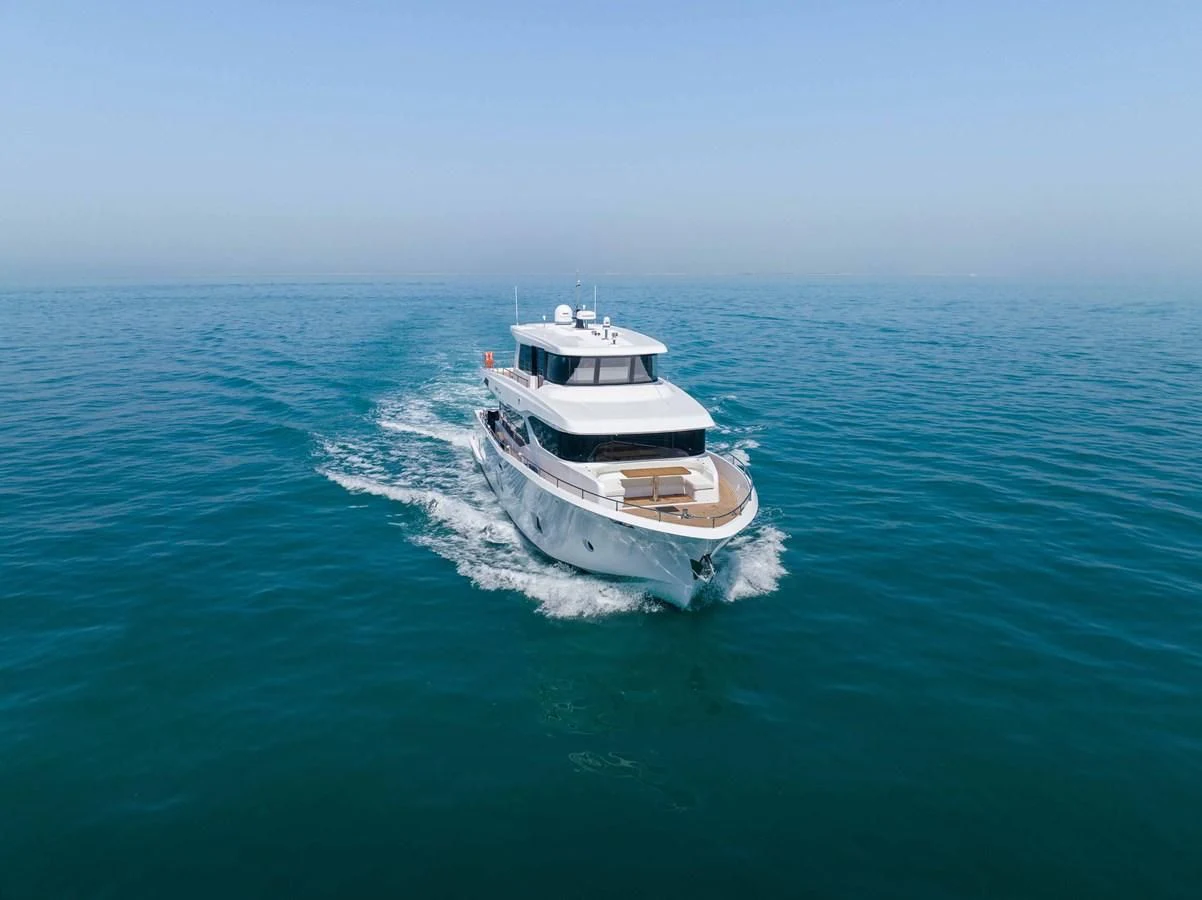 two boats on the water aboard NOMAD 70 SUV Yacht for Sale