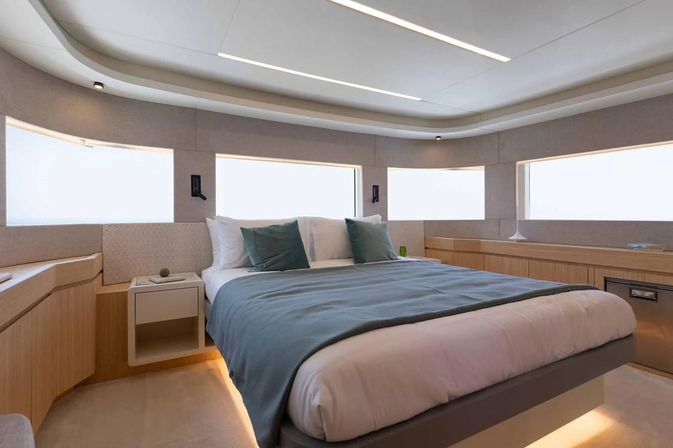 a bed in a room aboard NOMAD 70 SUV Yacht for Sale