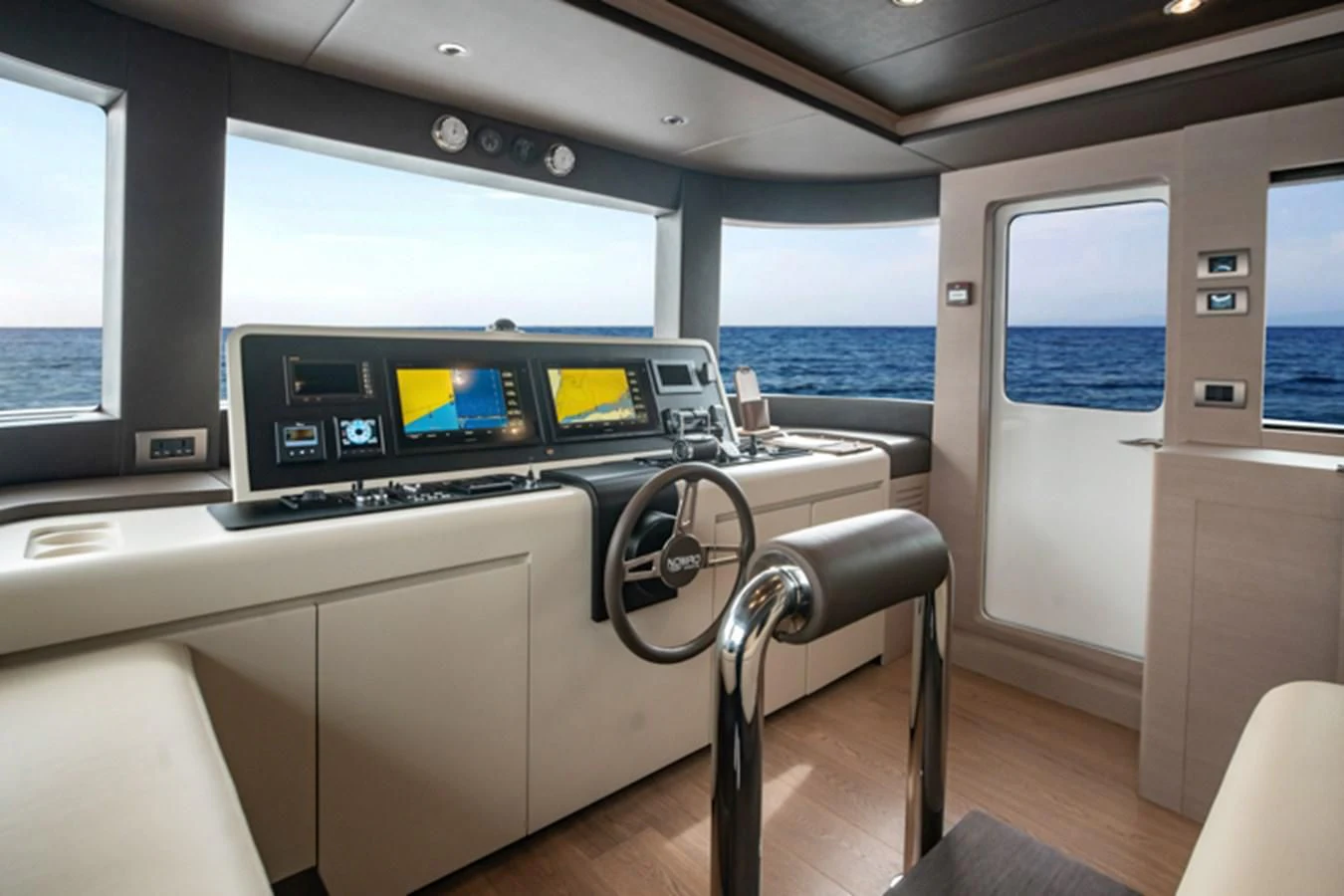 a vehicle with a large screen aboard NOMAD 70 SUV Yacht for Sale