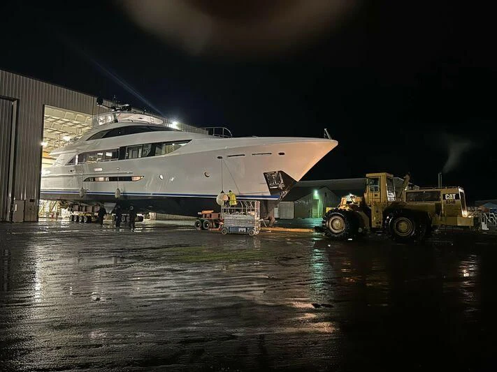 a plane parked next to a truck aboard SEAS THE DAY Yacht for Sale