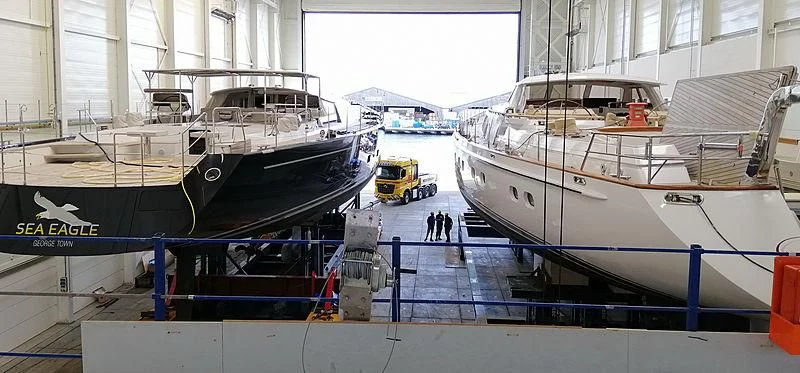 a group of boats are parked in a dock aboard JULIET Yacht for Sale