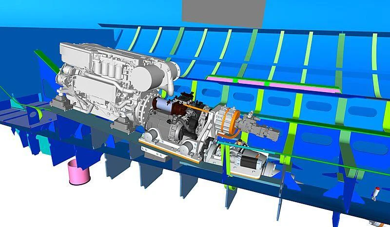 a toy robot on a blue surface aboard JULIET Yacht for Sale