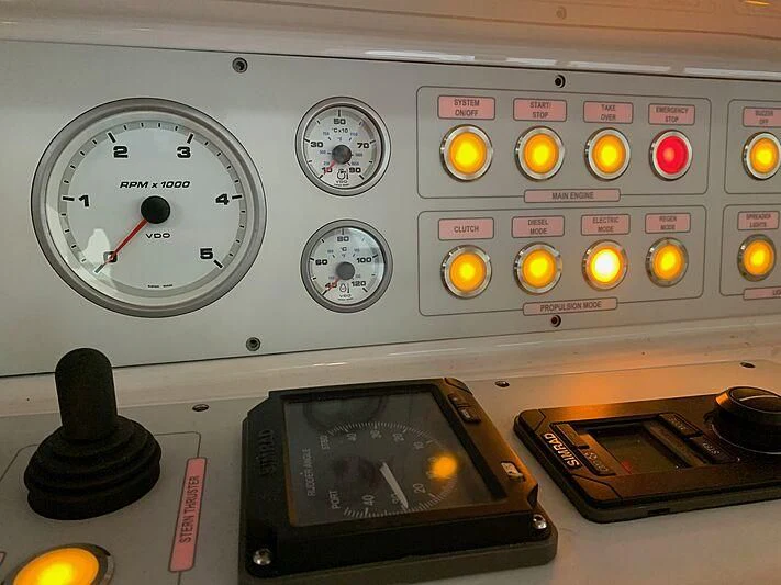 a radio and a book aboard JULIET Yacht for Sale