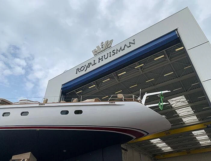 a large airplane with a sign on the front aboard JULIET Yacht for Sale