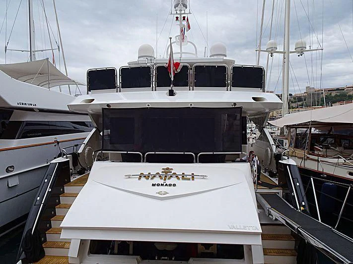 a boat docked at a pier aboard NATALI OF MONACO Yacht for Sale