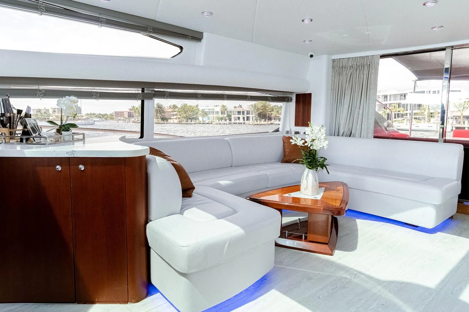 a living room with a couch and a coffee table aboard SOUL MATES Yacht for Sale