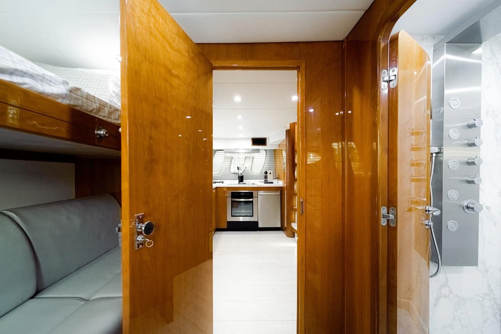 a room with a bed and a desk aboard SOUL MATES Yacht for Sale