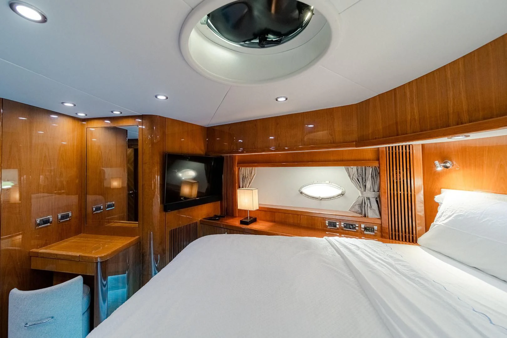 a room with a bed and a table aboard SOUL MATES Yacht for Sale