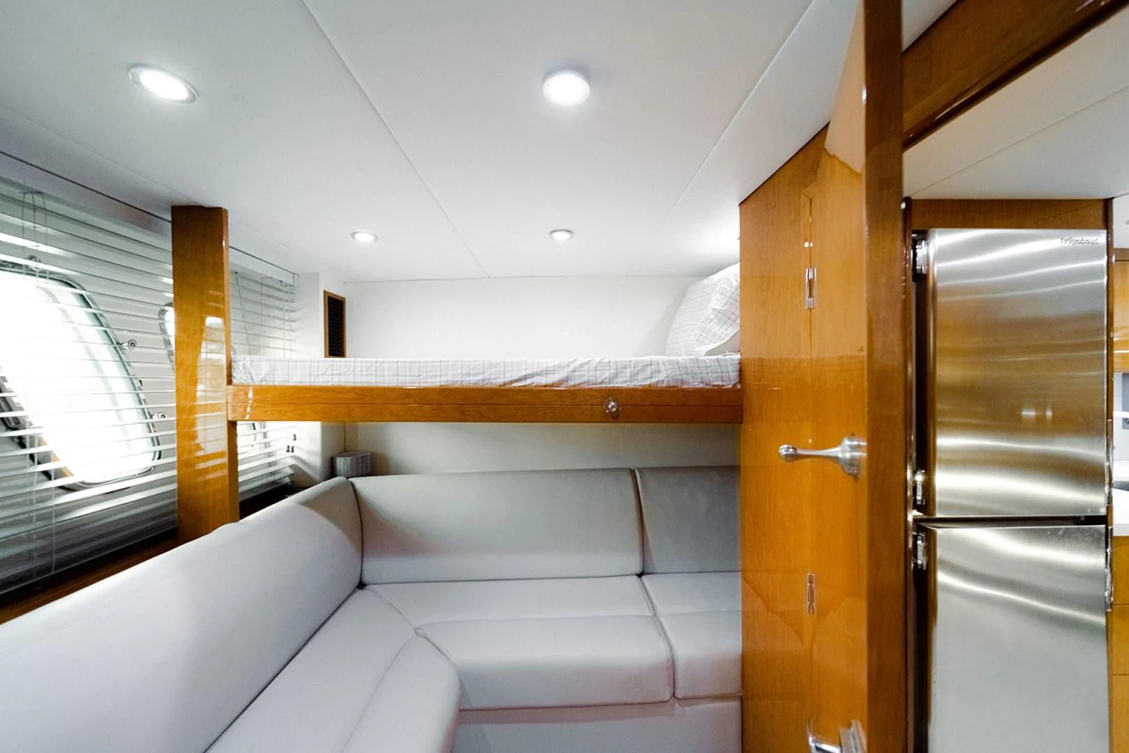 a room with a couch and a door aboard SOUL MATES Yacht for Sale