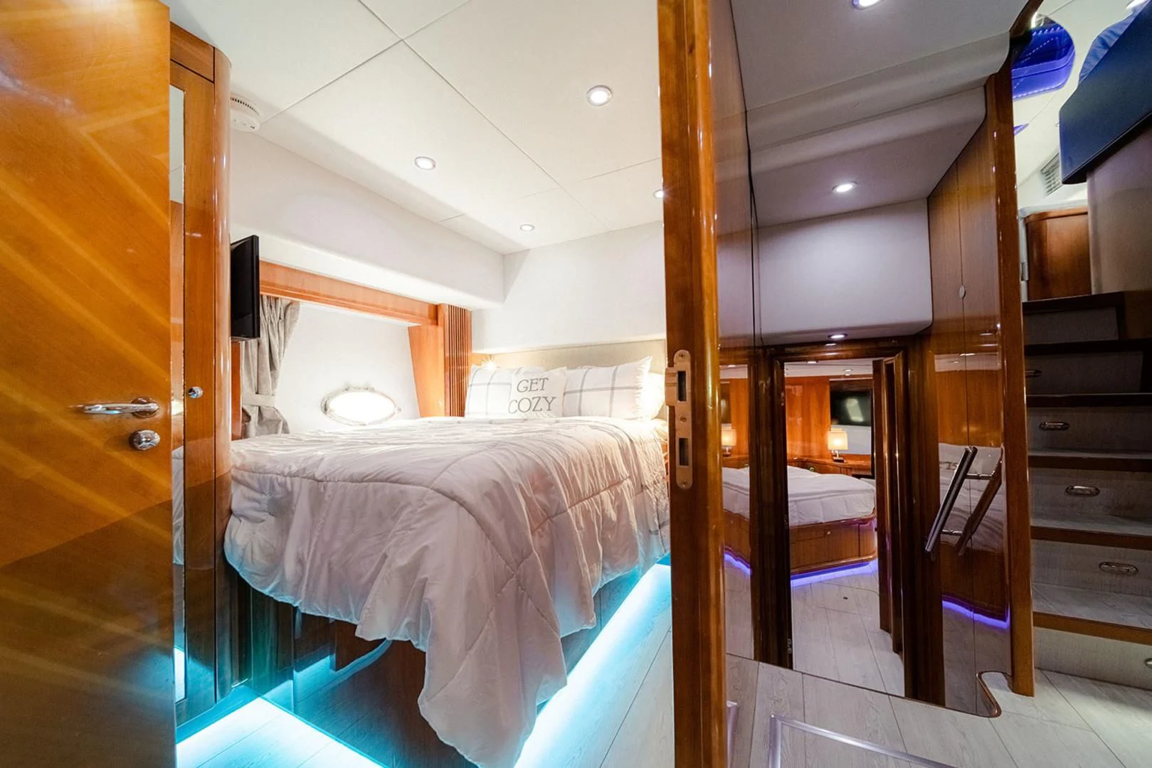 a room with a bed and a closet aboard SOUL MATES Yacht for Sale