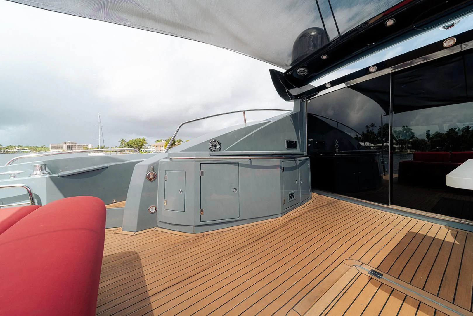 a large silver boat on a wooden deck aboard SOUL MATES Yacht for Sale