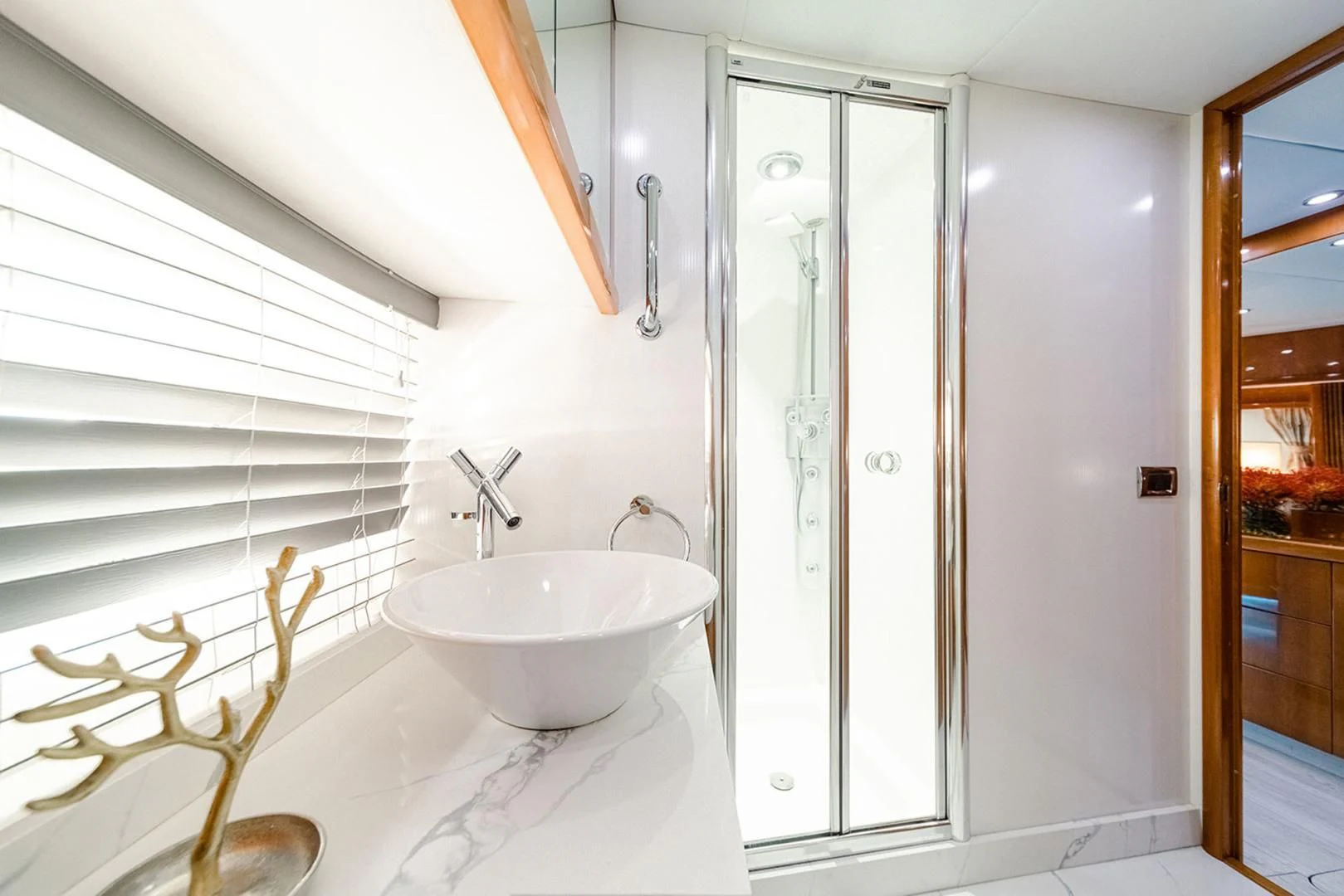 a bathroom with a sink and a shower aboard SOUL MATES Yacht for Sale