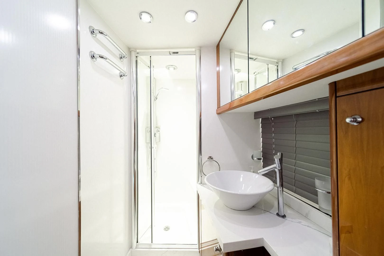 a bathroom with a sink and a shower aboard SOUL MATES Yacht for Sale