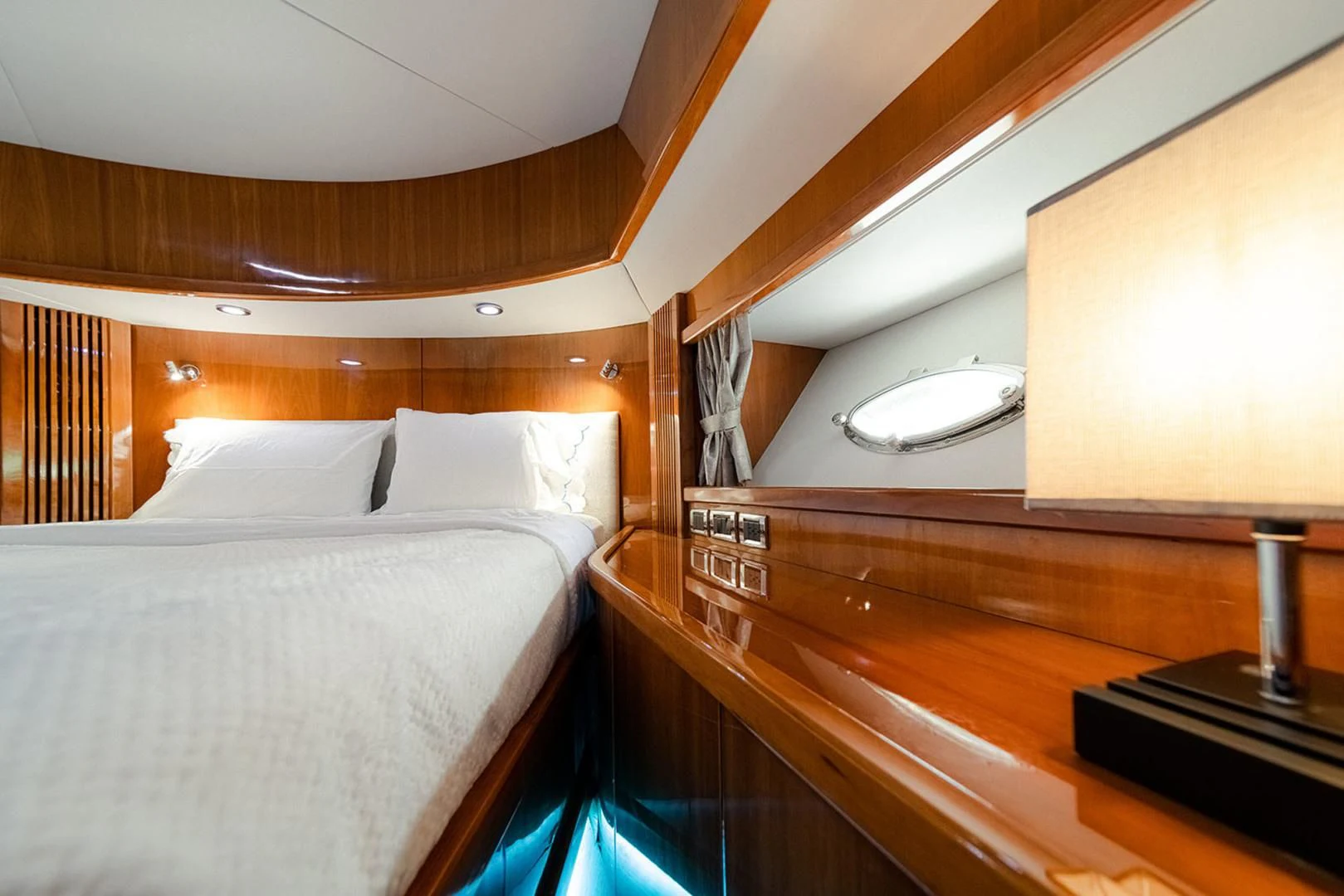 a bed with a white bed aboard SOUL MATES Yacht for Sale