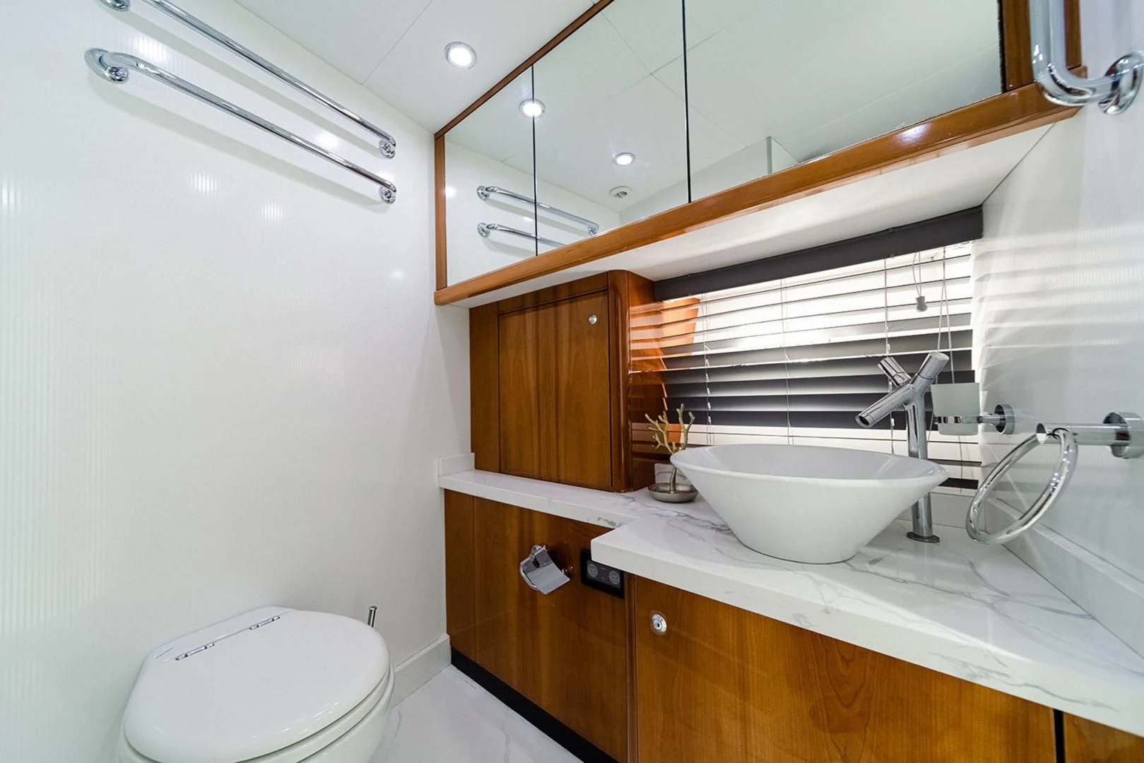 a bathroom with a sink and toilet aboard SOUL MATES Yacht for Sale