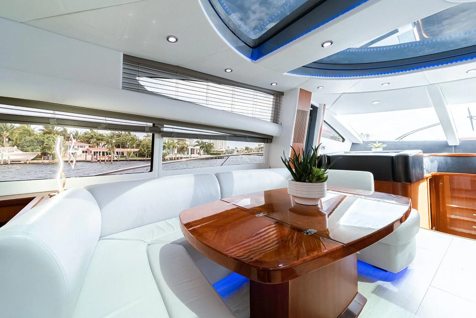 a room with a table and chairs aboard SOUL MATES Yacht for Sale