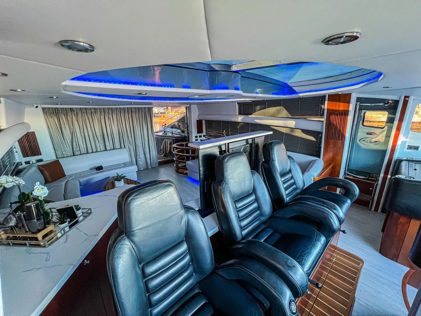inside of a vehicle with chairs and tables aboard SOUL MATES Yacht for Sale