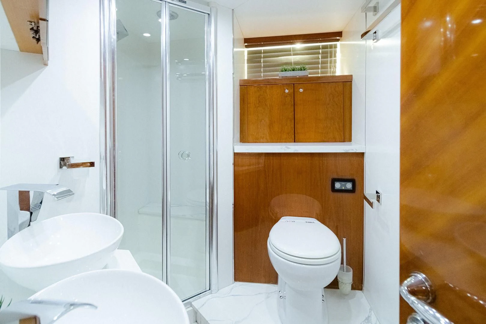 a bathroom with a toilet and sink aboard SOUL MATES Yacht for Sale