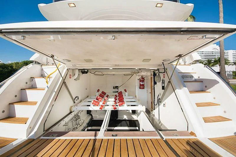 a white boat with a deck aboard DELFINO Yacht for Sale