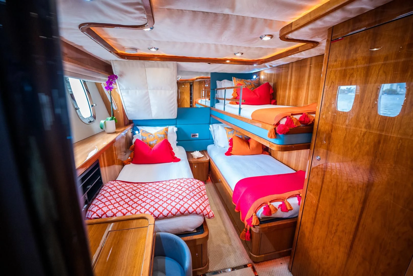 a cabin with a bed and a table aboard DELFINO Yacht for Sale