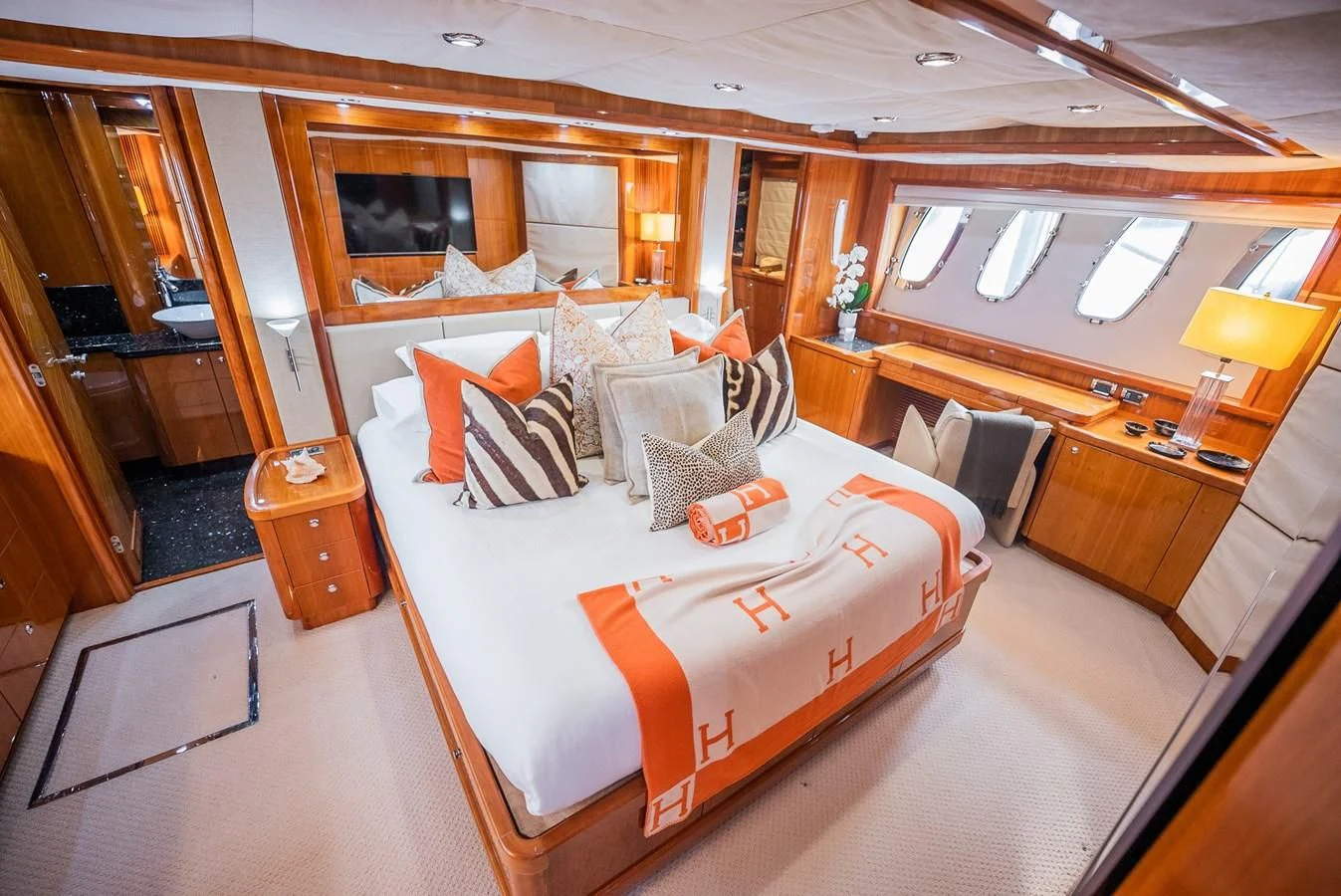 a large bedroom with a large bed aboard DELFINO Yacht for Sale