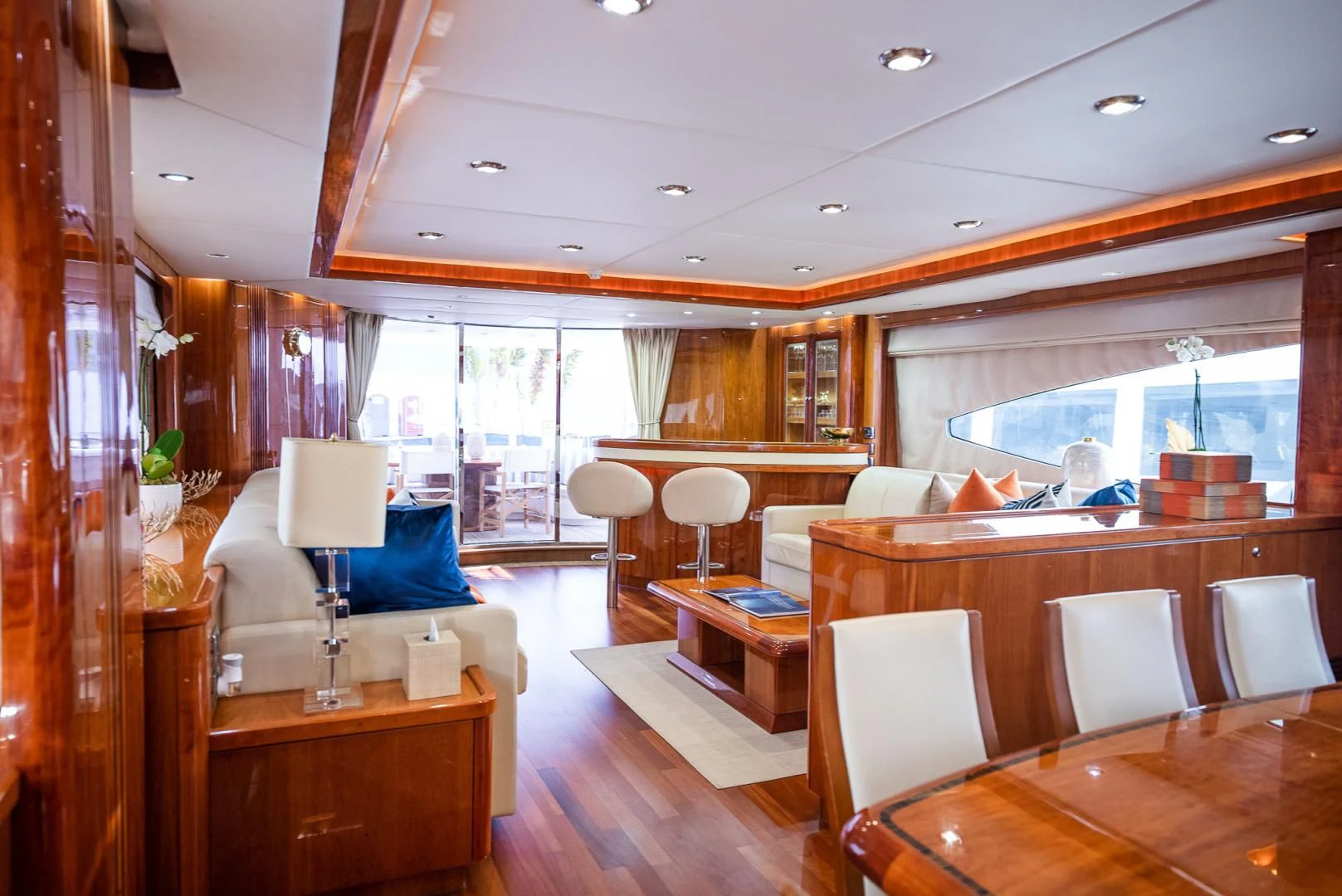 a room with a table chairs and a window aboard DELFINO Yacht for Sale