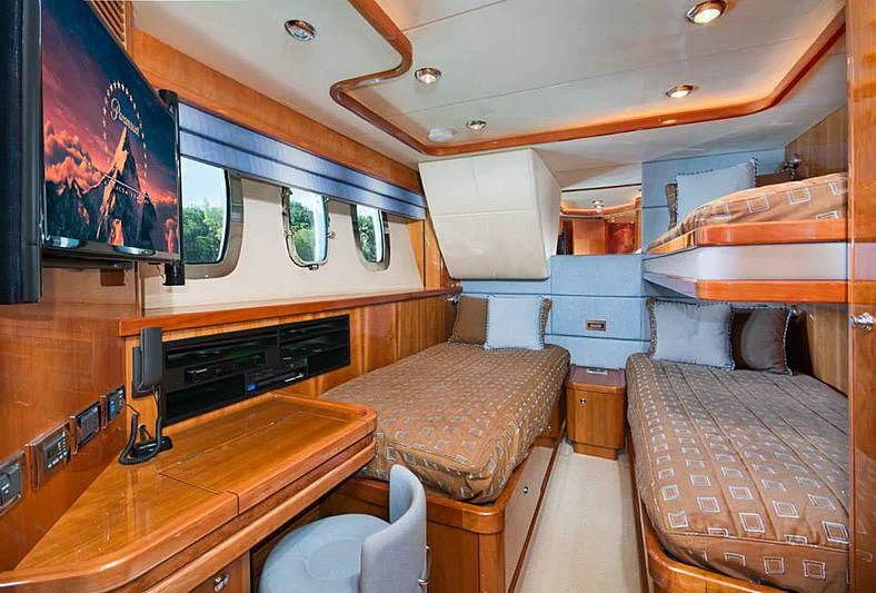a room with a bed and a couch aboard DELFINO Yacht for Sale