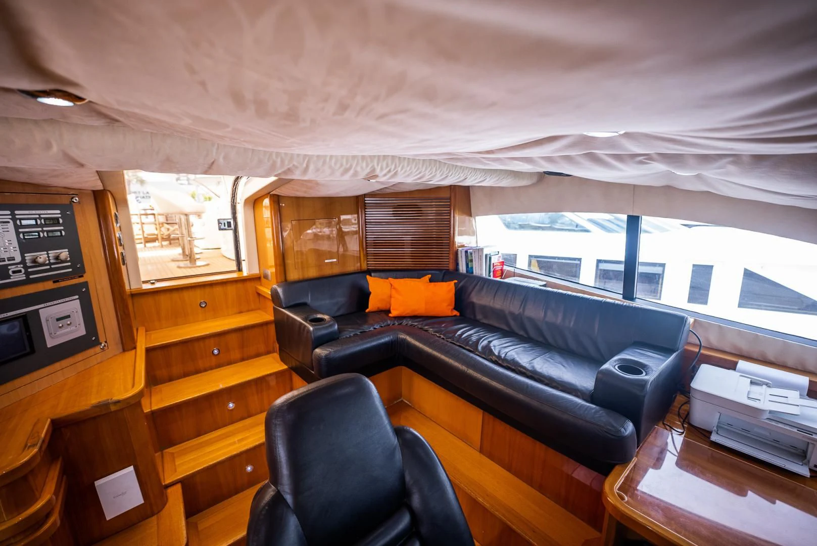 a leather couch in a room aboard DELFINO Yacht for Sale