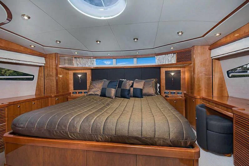 a bed in a room aboard DELFINO Yacht for Sale