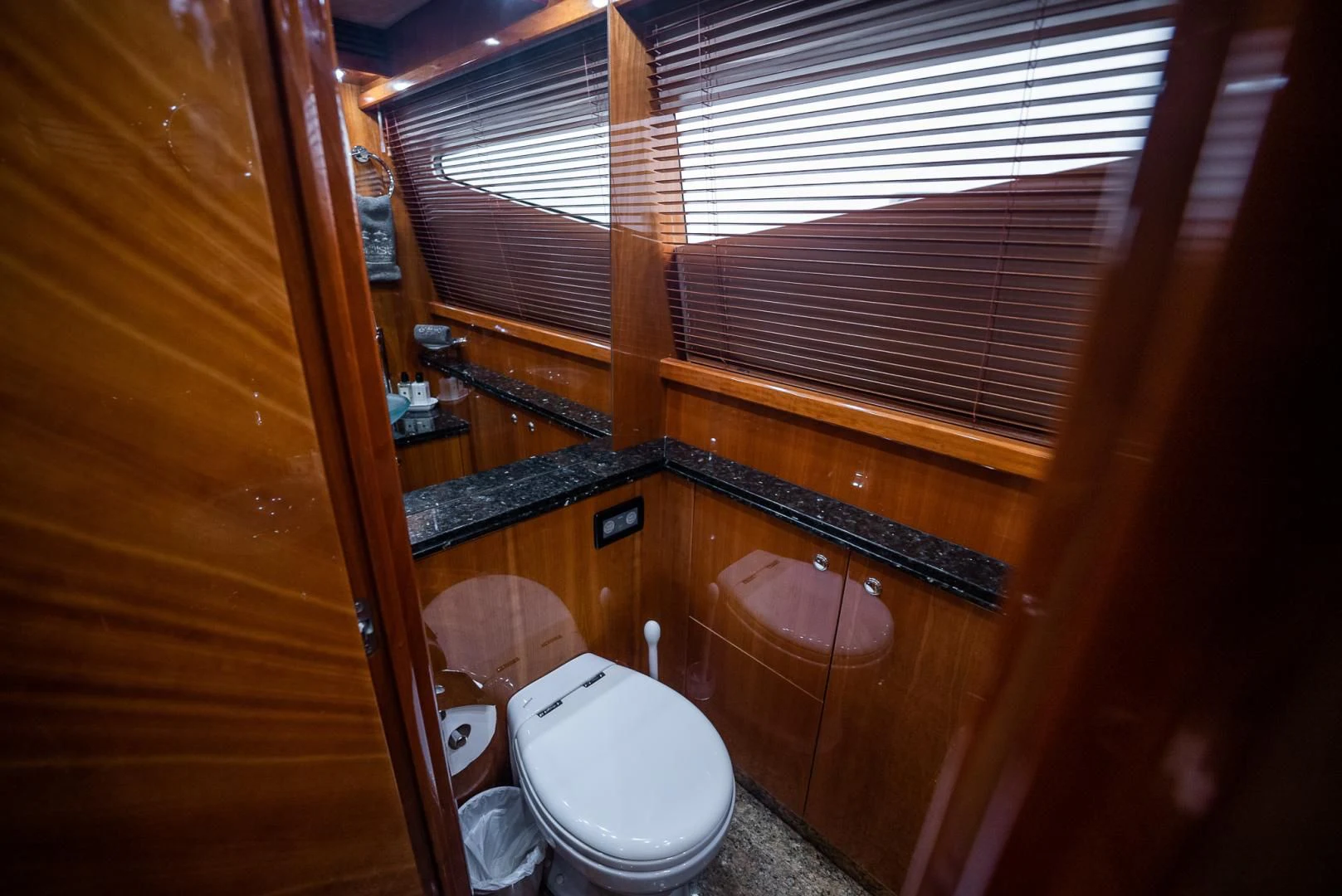 a toilet in a bathroom aboard DELFINO Yacht for Sale