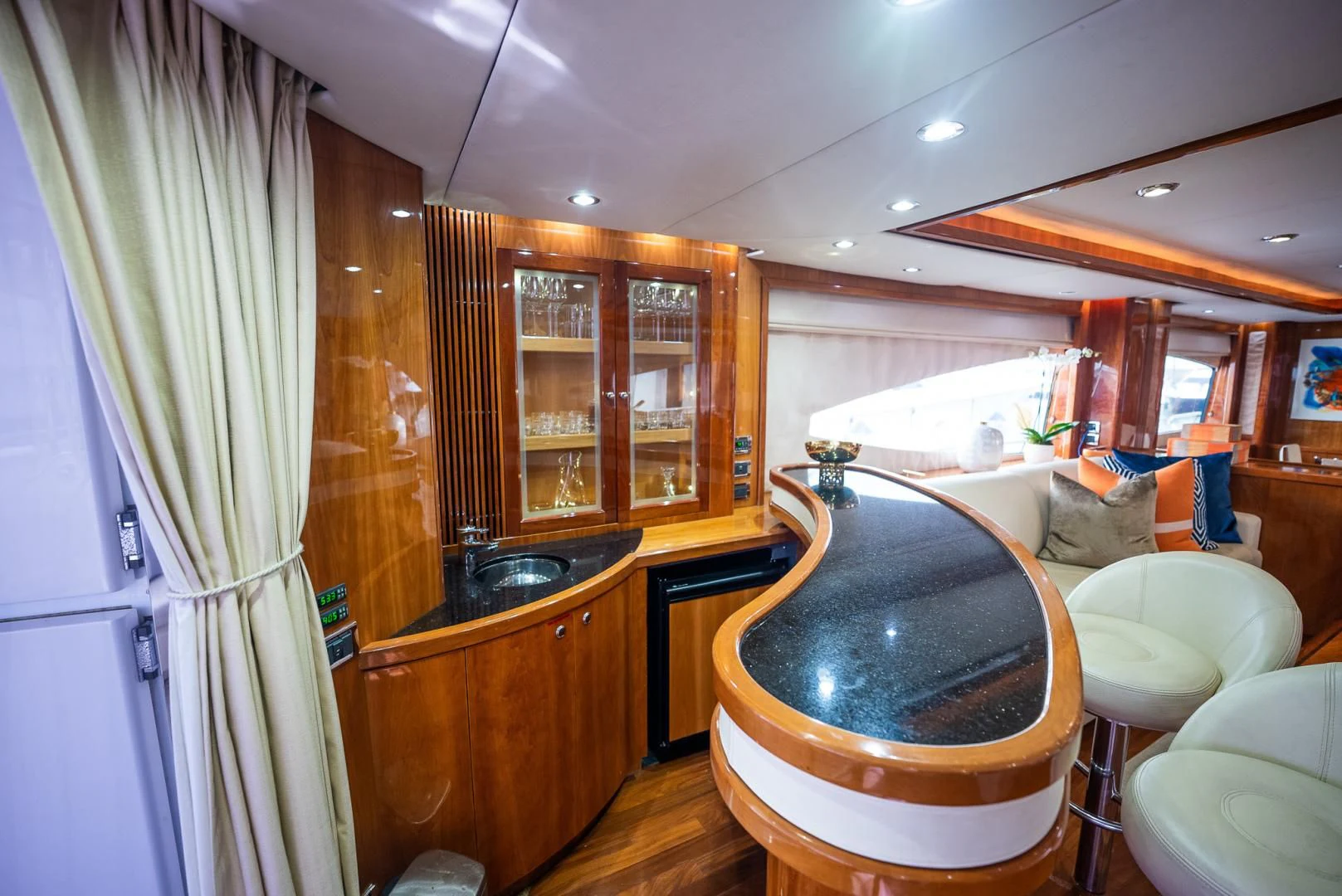 a bathroom with a tub sink and cabinets aboard DELFINO Yacht for Sale
