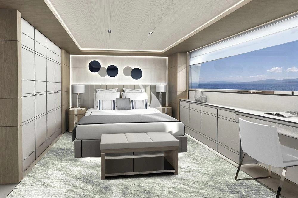 a room with a bed and a desk aboard LASATA Yacht for Sale