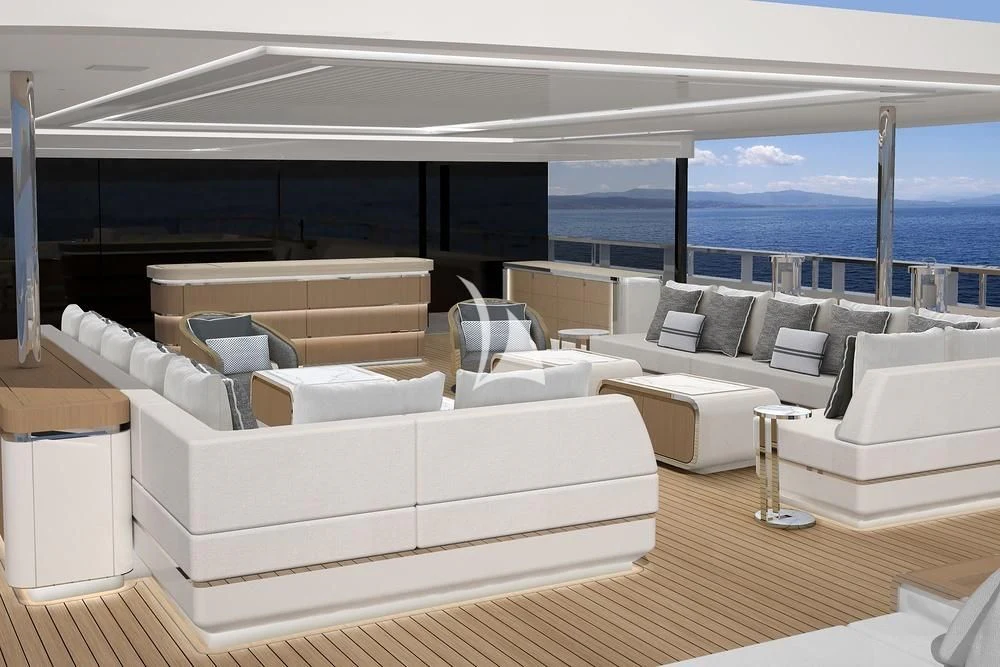 a room with couches and a table aboard LASATA Yacht for Sale