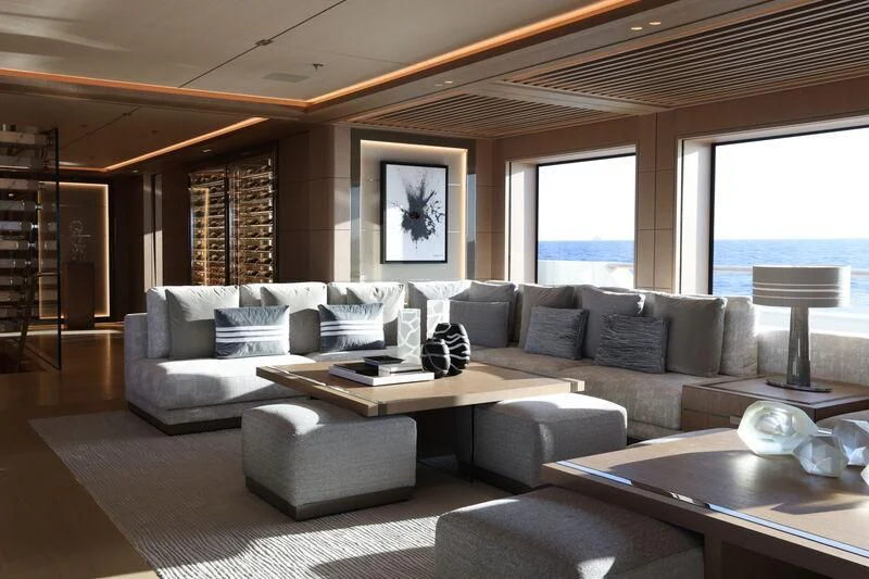 a living room with a large window aboard LASATA Yacht for Sale