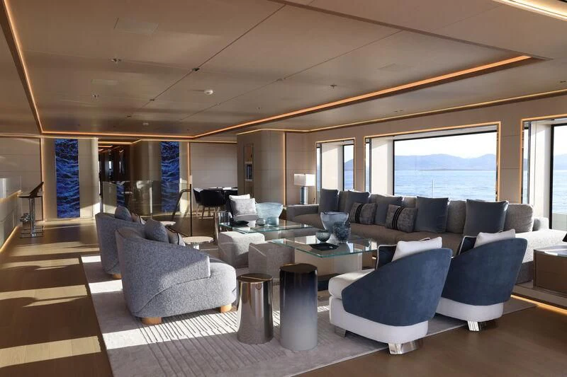 a living room with a large window aboard LASATA Yacht for Sale