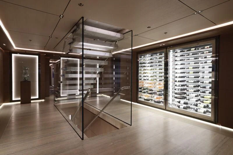 a room with a large glass wall aboard LASATA Yacht for Sale
