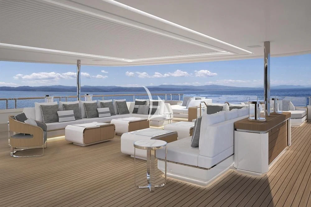 a room with couches and tables aboard LASATA Yacht for Sale