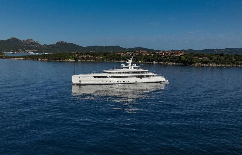 a white boat on water aboard LASATA Yacht for Sale