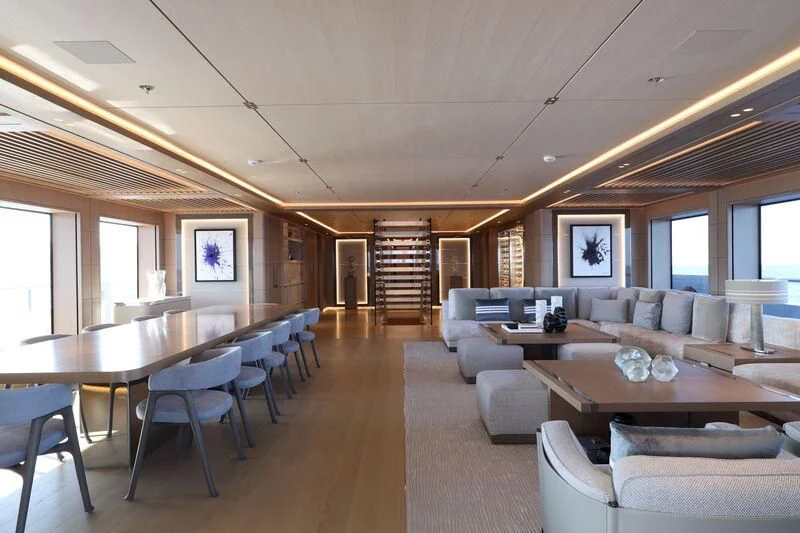 a living room with a staircase aboard LASATA Yacht for Sale