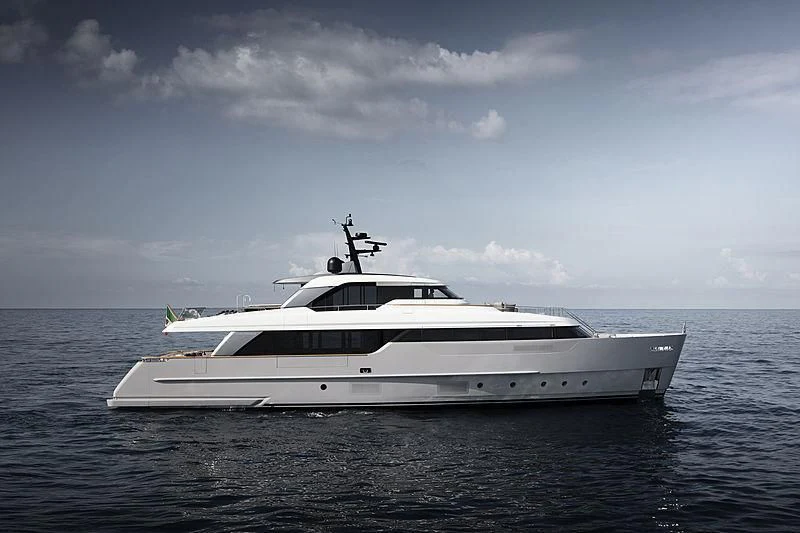 a white yacht in the water aboard NOW Yacht for Sale