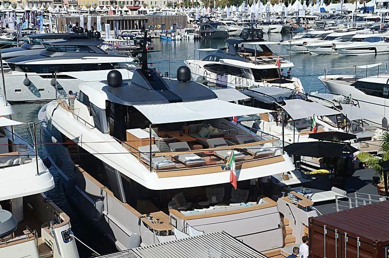 a marina full of boats aboard NOW Yacht for Sale