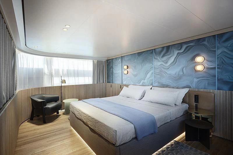 a bed in a room aboard NOW Yacht for Sale