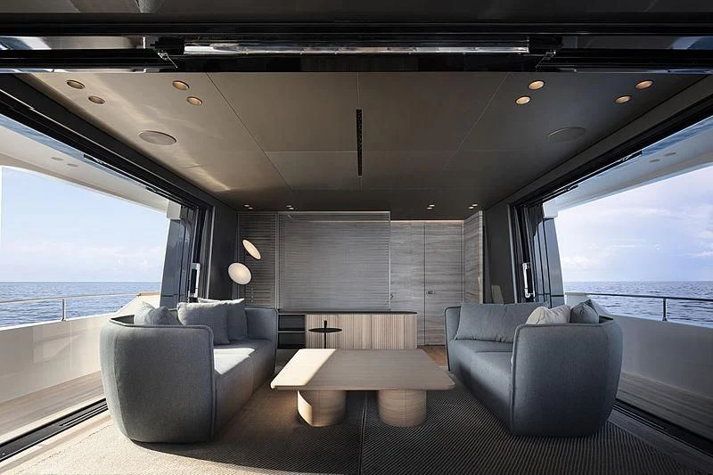 a car with a view of the ocean aboard NOW Yacht for Sale