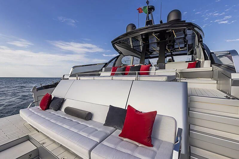 a boat with a red and white stripe on the front aboard ALDABRA Yacht for Sale