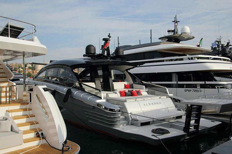 a boat docked at a pier aboard ALDABRA Yacht for Sale