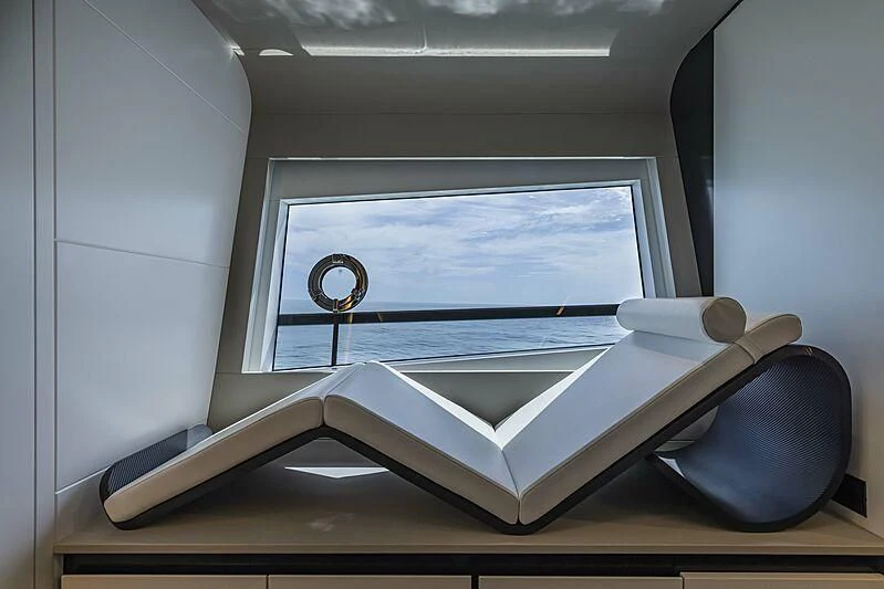 a book on a table aboard ALDABRA Yacht for Sale
