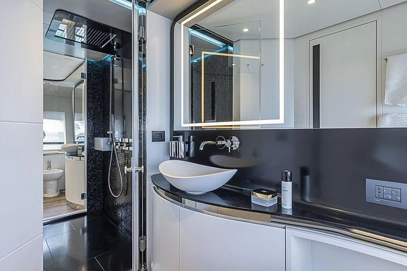 a bathroom with a sink and a mirror aboard ALDABRA Yacht for Sale