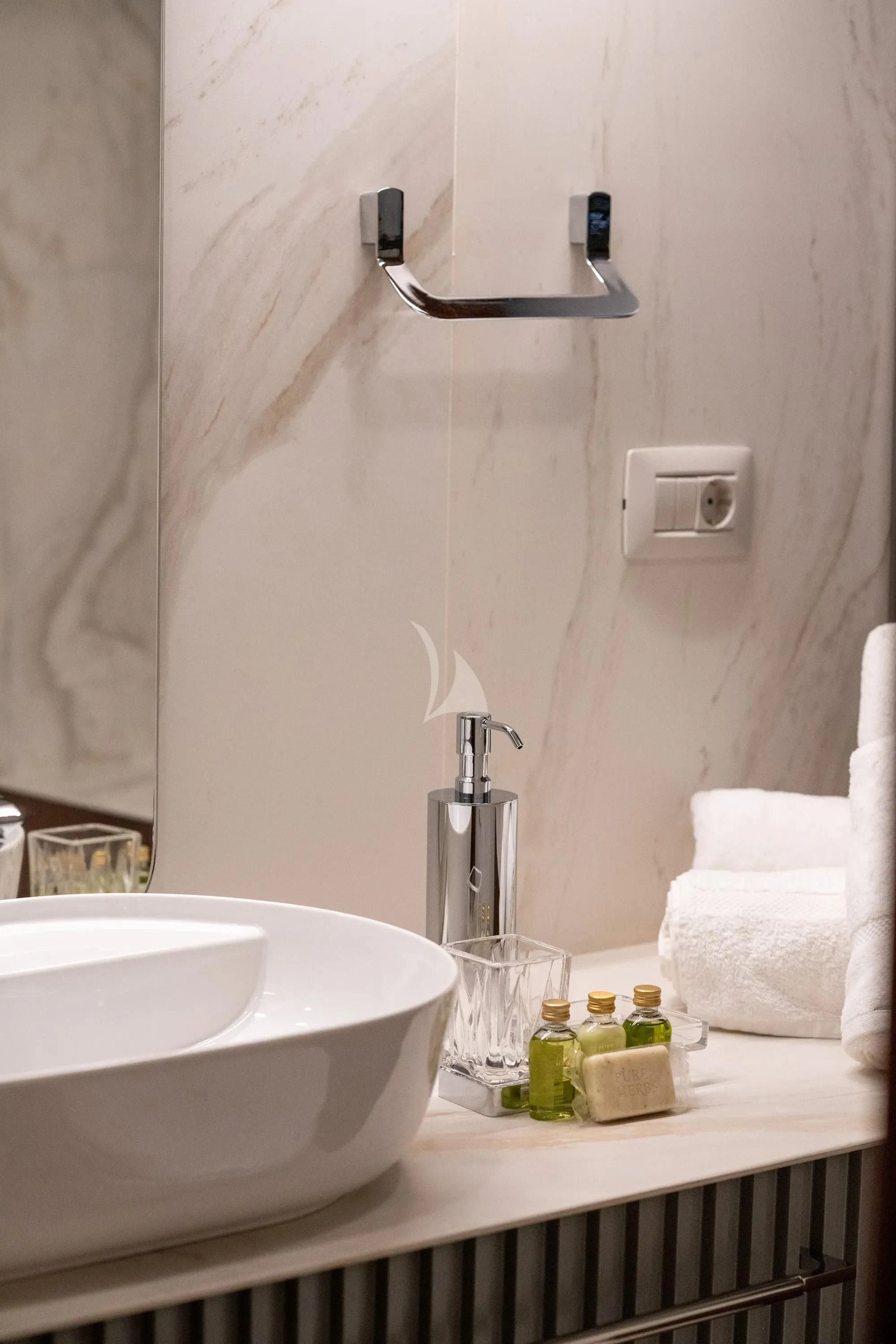 a bathroom sink with a mirror above it aboard NURTEN A Yacht for Sale
