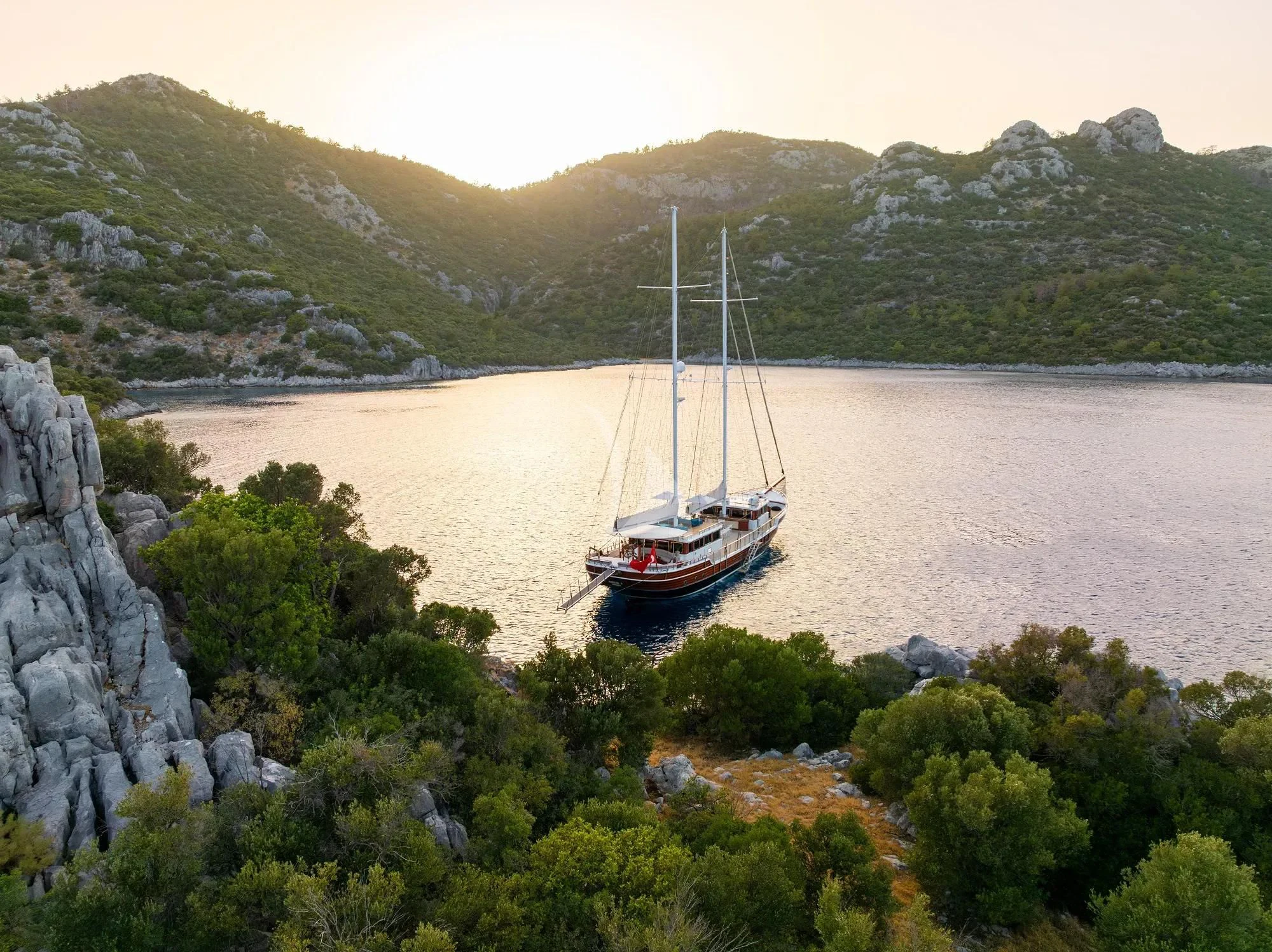 a boat sailing on a lake aboard NURTEN A Yacht for Sale