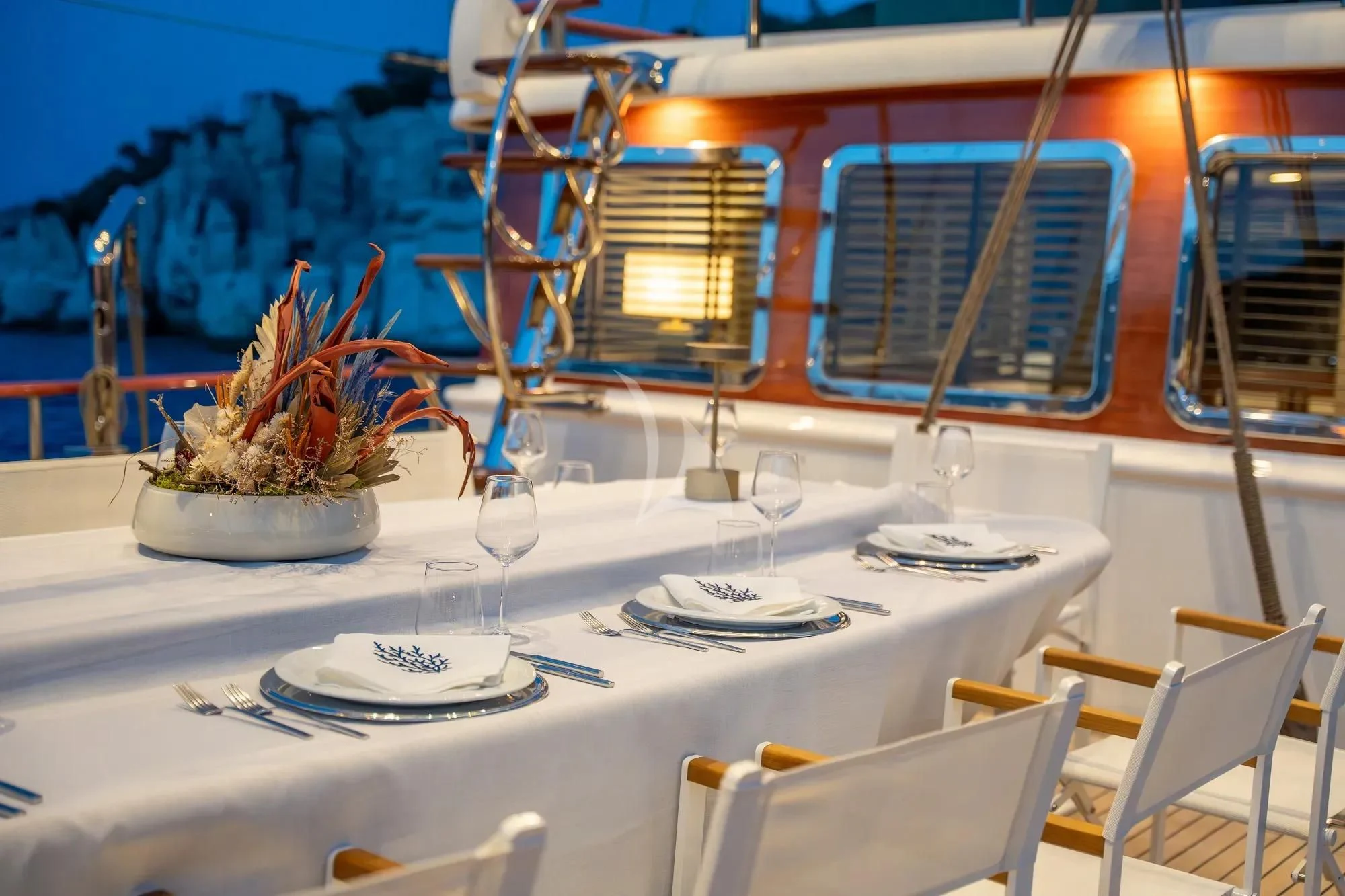 a table with a plant in a pot on it aboard NURTEN A Yacht for Sale